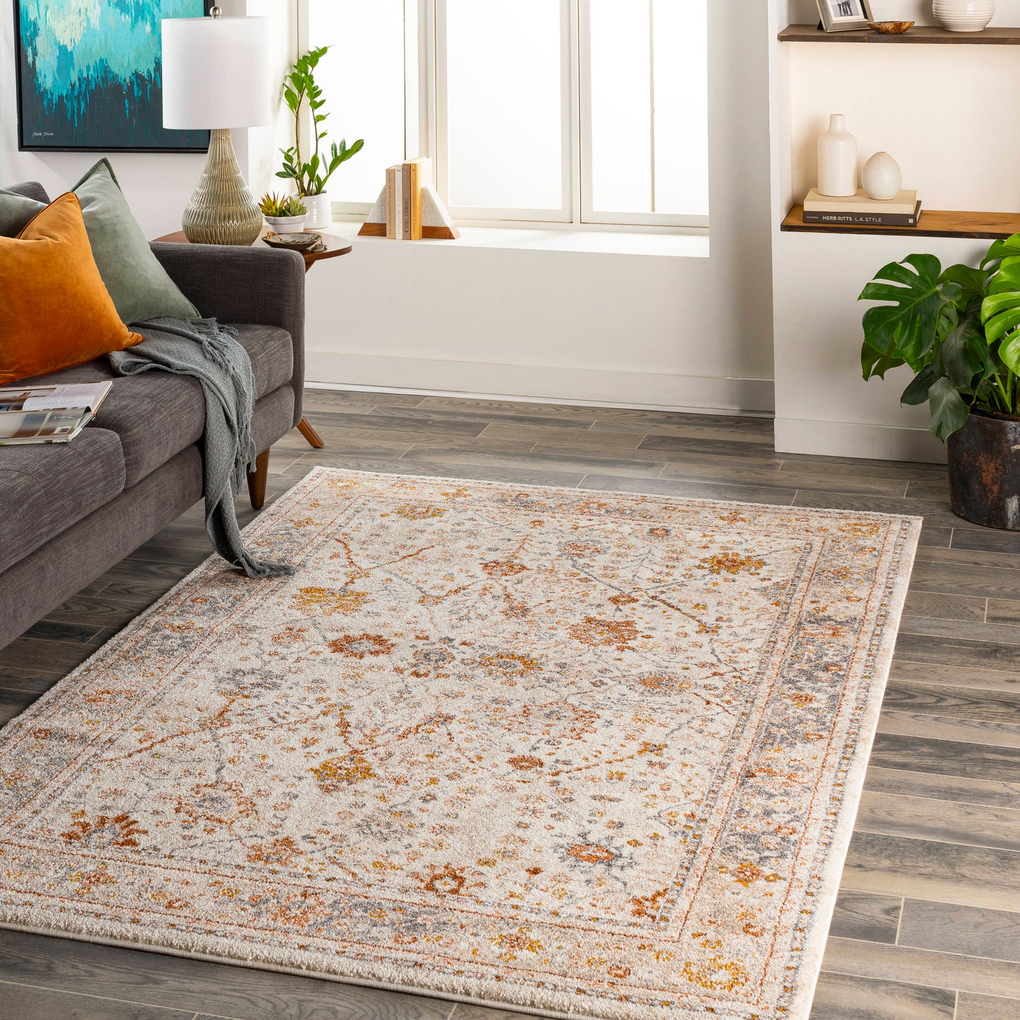allen + roth with STAINMASTER Camille Border 6 x 9 (ft) Loomed Polypropylene Beige Rectangular Indoor Floral/Botanical French Country Spot Clean Only Pet Friendly Area rug