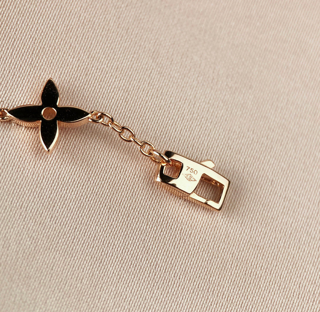 LOUIS VUITTON STAR AND SUN 7 MOTIFS GOLD BRACELET