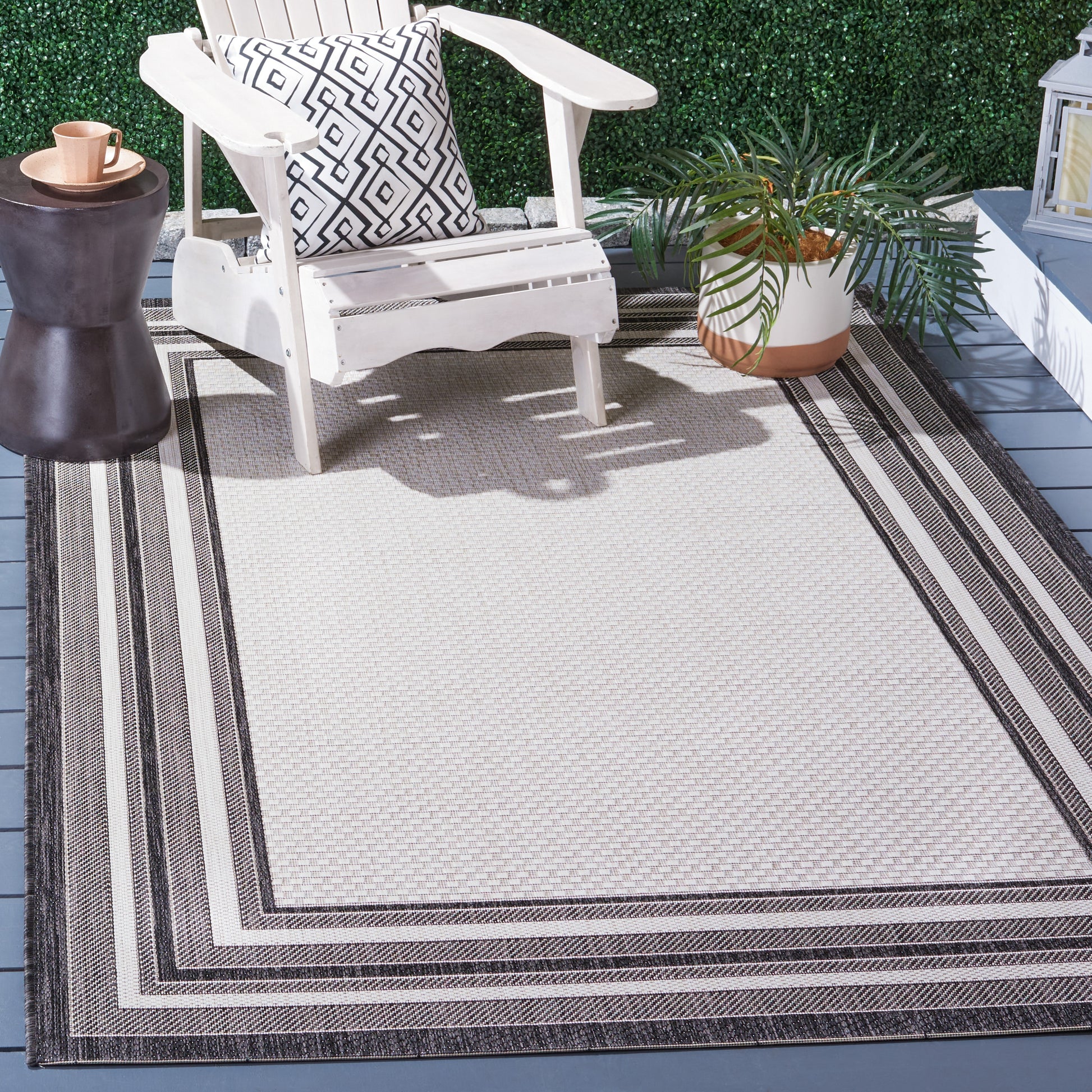 Safavieh Courtyard 10 x 14 (ft) Loomed Synthetic Ivory/Black Rectangular Indoor/Outdoor Border Professionally Clean Only Area rug