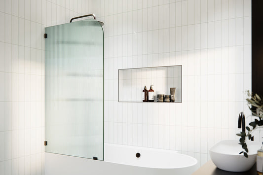 Glass Warehouse Aurora Oil Rubbed Bronze 34-in W x 58.25-in H Frameless Fluted Glass Fixed Bathtub door