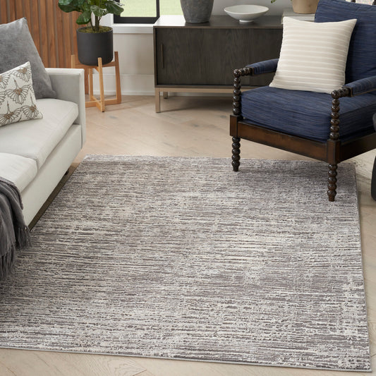 Nourison Home Eco-Friendly 6 x 9 (ft) Loomed Polyester Ivory Grey Rectangular Indoor Abstract Professionally Clean Only Area rug