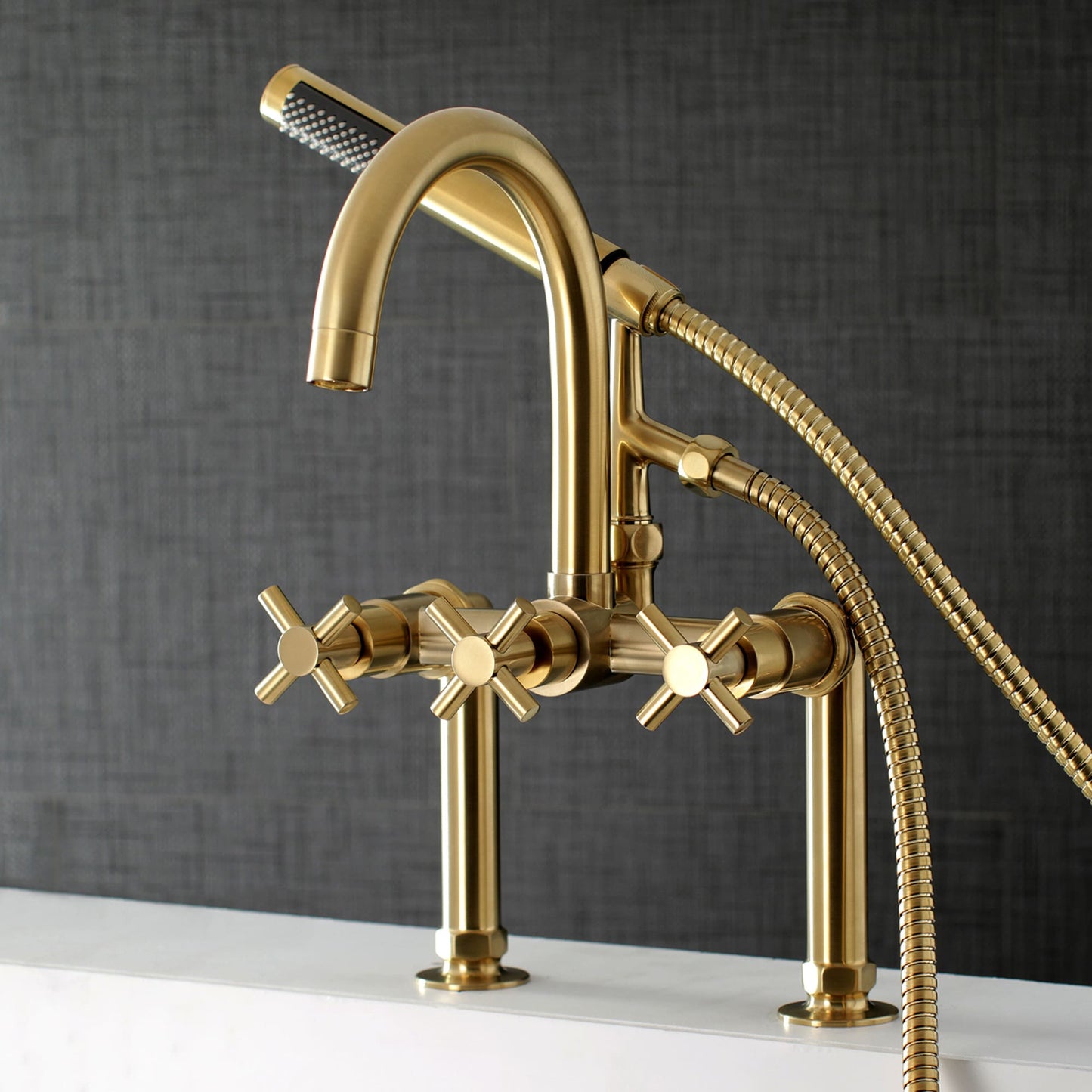 Kingston Brass Concord Brushed brass 3-handle Deck-mount Roman High-arc Bathtub Faucet with Hand Shower ( Valve Included )