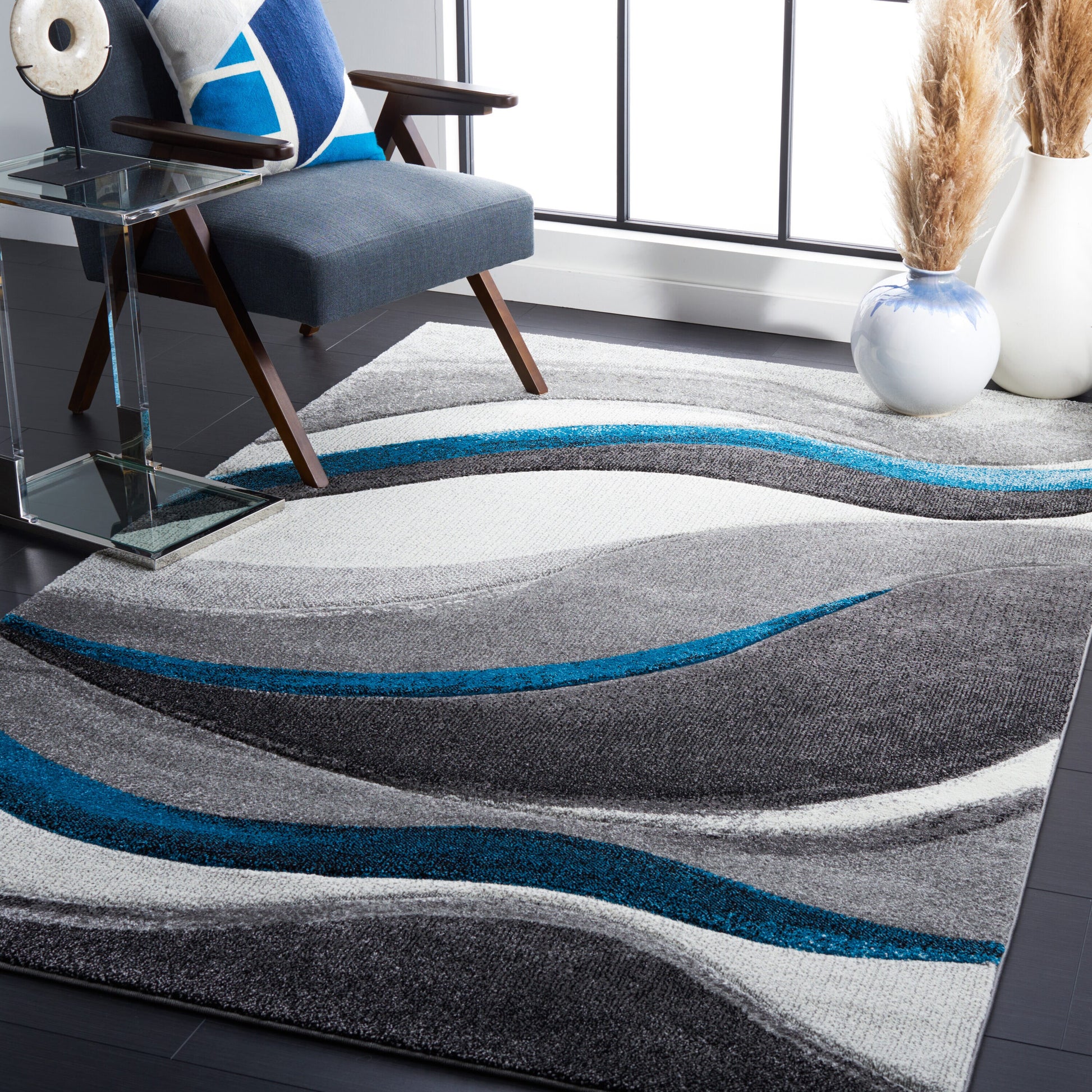 Safavieh Hollywood 7 x 9 (ft) Loomed Polypropylene Grey/Turquoise Rectangular Indoor Abstract Mid-Century Modern Spot Clean Only Area rug