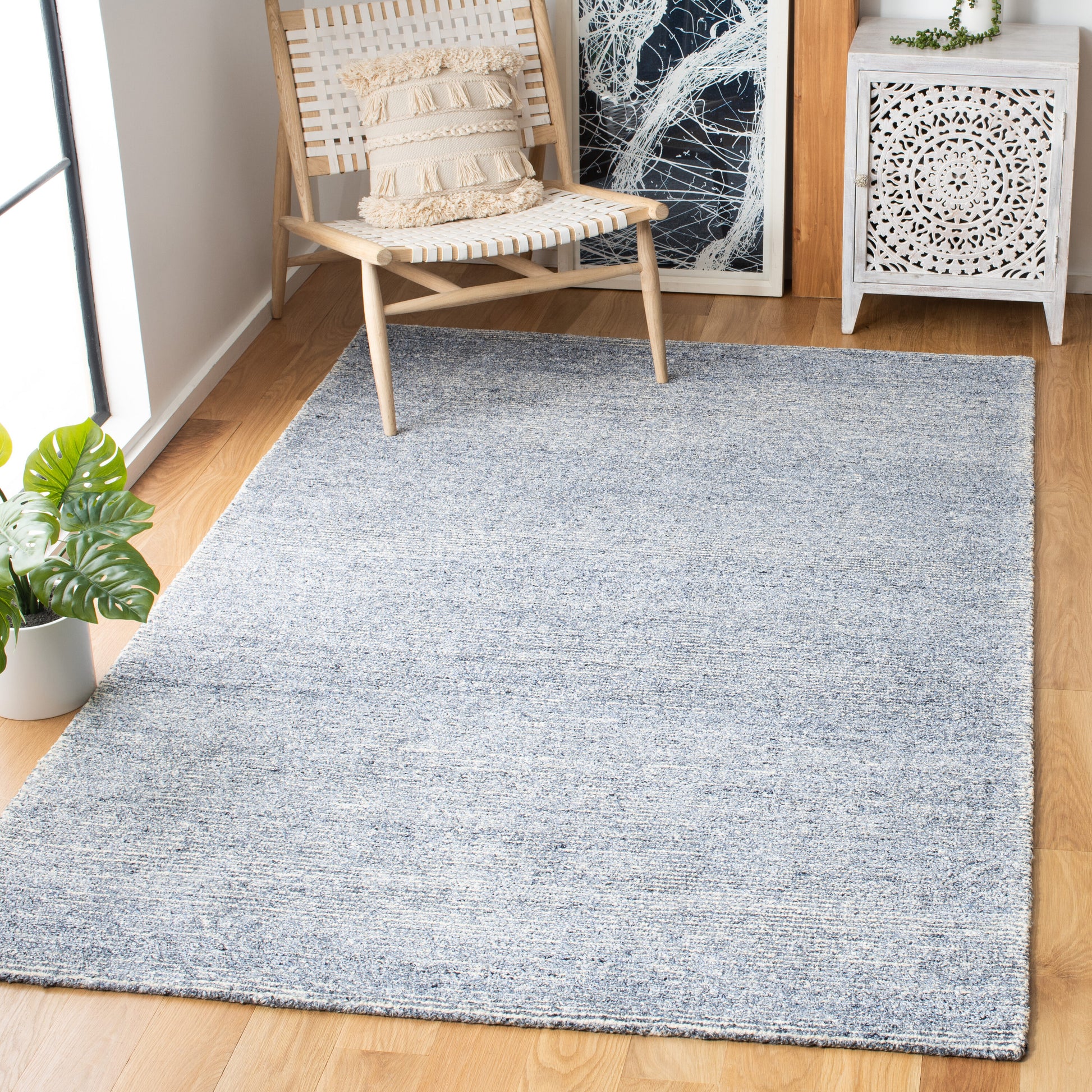 Safavieh Himalaya 5 x 8 (ft) Tufted Wool Blue Rectangular Indoor Solid Spot Clean Only Area rug