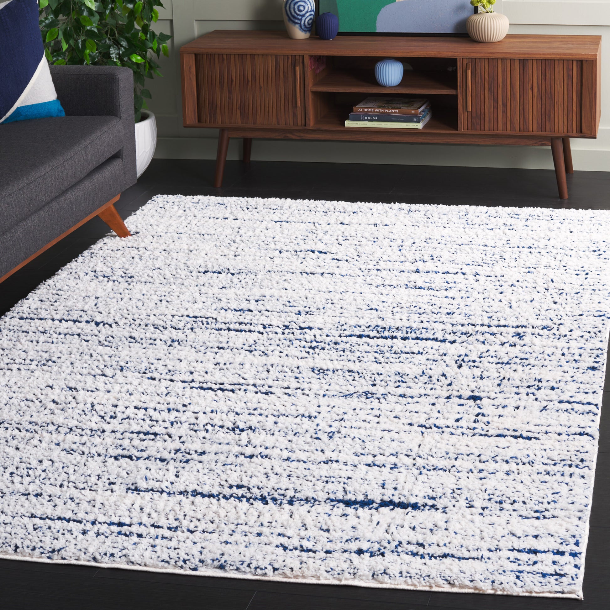 Safavieh Rumi Shag 8 x 10 (ft) Loomed Polyester Navy/Ivory Rectangular Indoor Solid Spot Clean Only Area rug