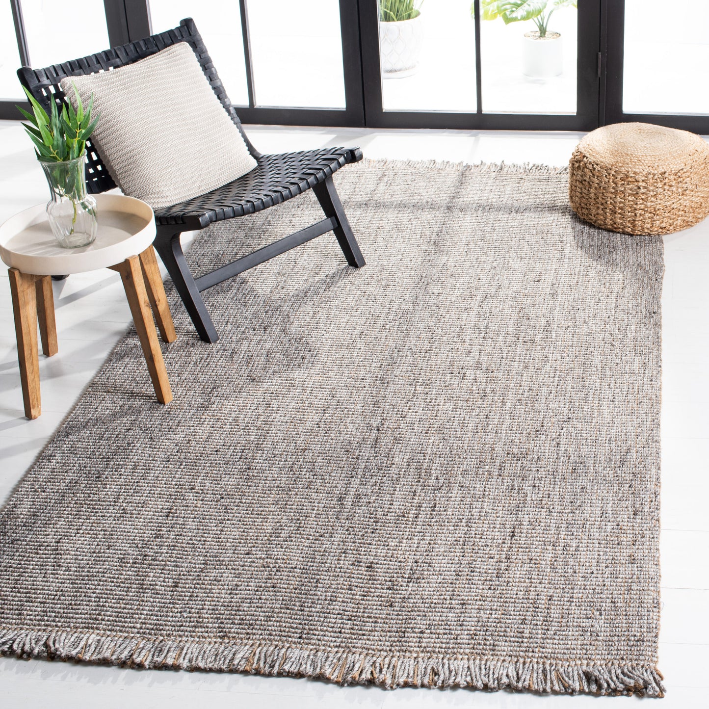 Safavieh Natural Fiber 6 x 9 (ft) Knotted Jute Gray/Natural Rectangular Indoor Solid Mid-Century Modern Professionally Clean Only Area rug