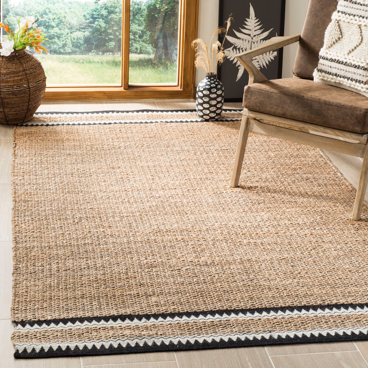 Safavieh Natural Fiber 9 x 12 (ft) Knotted Jute Natural/Black Rectangular Indoor Geometric Bohemian/Eclectic Spot Clean Only Area rug