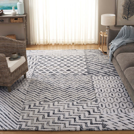 Safavieh  Ebony 813 Ivory/Black Contemporary 6ft x 9ft Medium Rectangle Rug